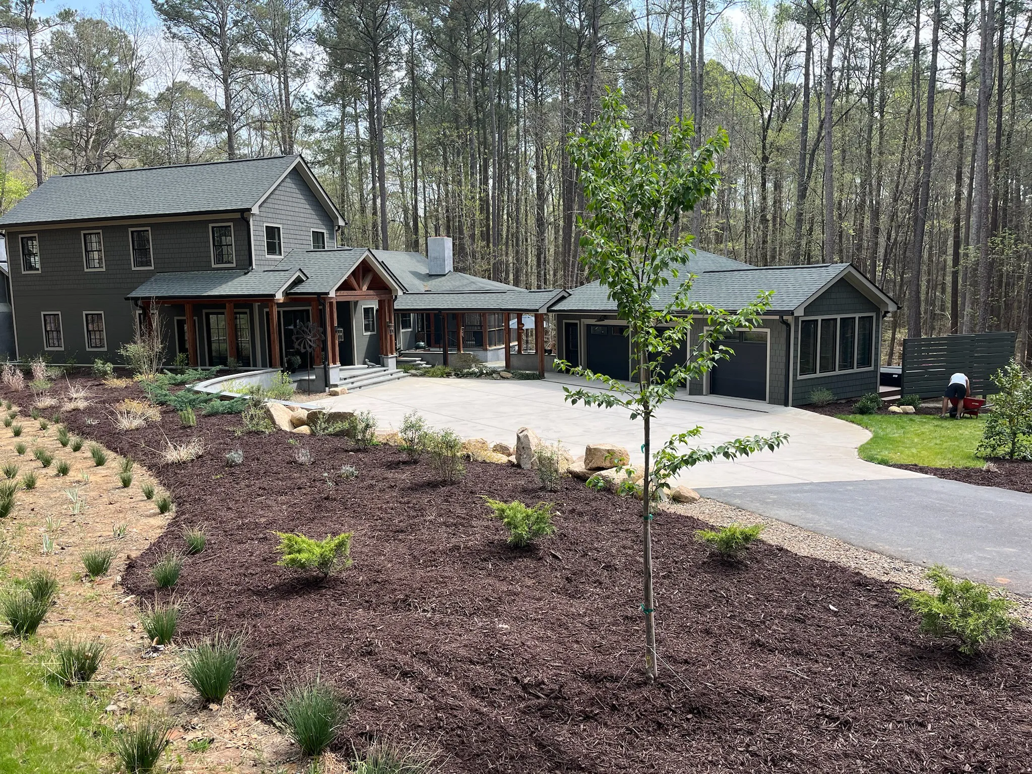 A Walter's project in Chapel Hill with fresh mulch beds and a newly finished driveway